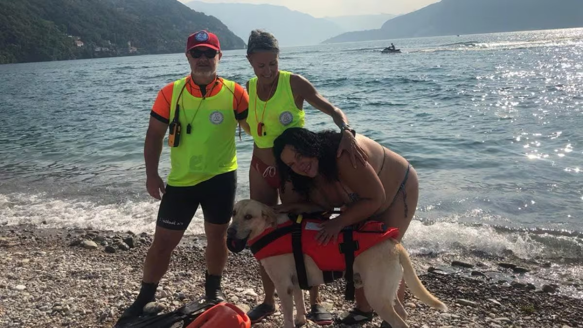 Si fa il bagno nel lago di Como ma la corrente la porta via, salvata da Sole, un cane bagnino